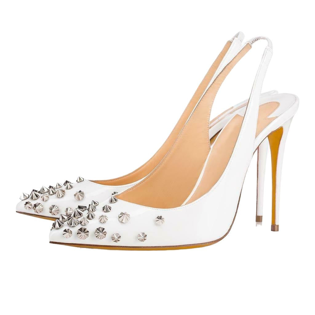 White spiked heel