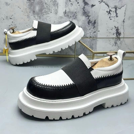 White and black loafers