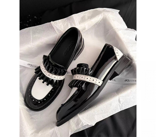 Black and white ladies loafers